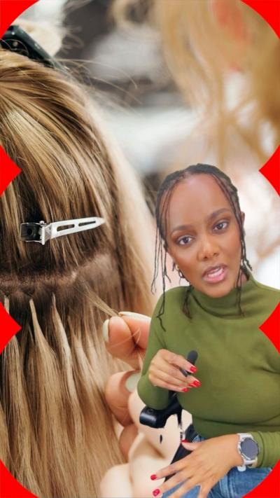 Woman in green top holding small microphone in front of green screen image of a woman's hair