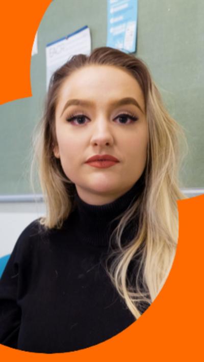 Presenter Ellie Colton looking at the camera 