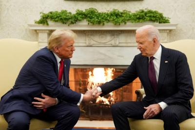 Donald Trump and Joe Biden shake hands