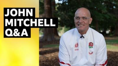 England rugby head coach John Mitchell smiling at the camera. 