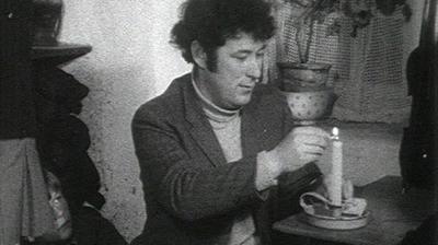 Seamus Heaney lights a candle