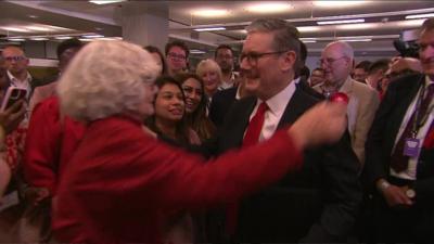 Keir Starmer about to be hugged