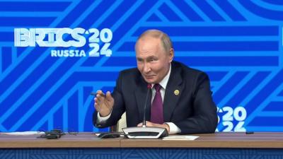 An image of Putin speaking during a Brics press conference