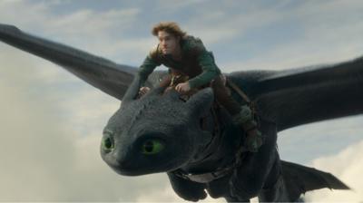 Boy riding a dragon