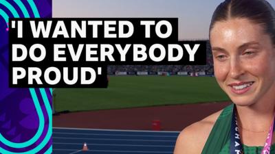 Kate O'Connor smiles during her post-heptathlon interview