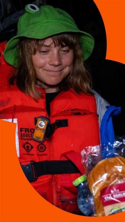 Greta Thunberg in a life vest