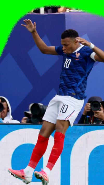 Kylian Mbappe celebrating after scoring 
