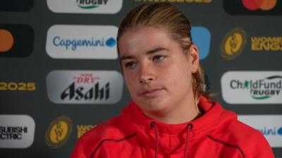 Bethan Lewis speaks to the media