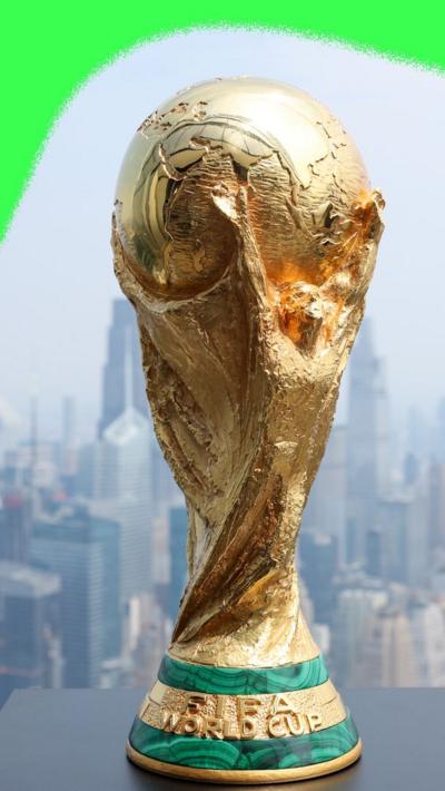 The World Cup with the New York skyline behind