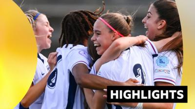 Lola Brown celebrates with teammates