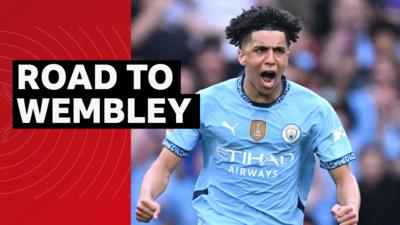 Manchester City's Rico Lewis celebrates