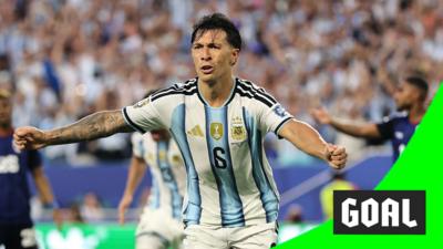 Lisandro Martínez runs to the crowd with his arms wide open to celebrate scoring for Argentina in the 2026 World Cup.