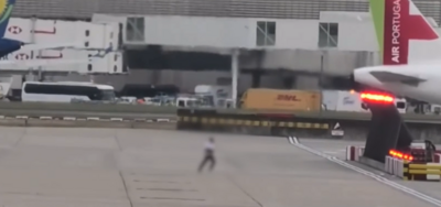 Man runs across Heathrow taxiway