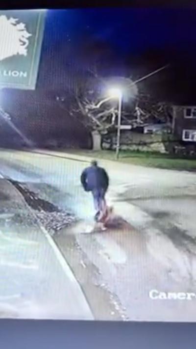 Man riding an e-scooter about to fall.