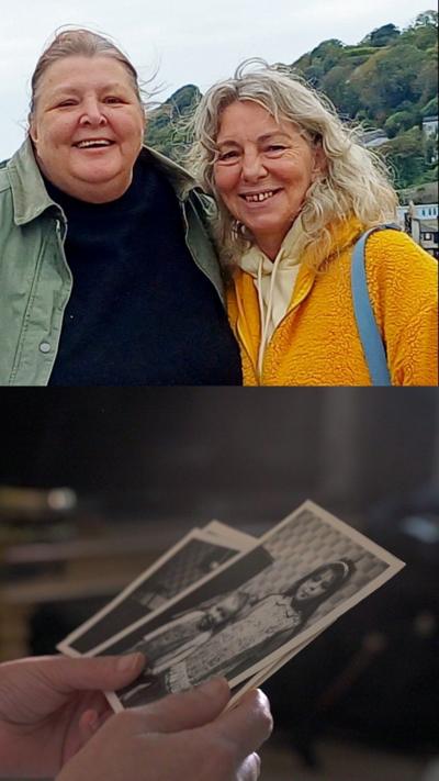 A picture of two women, one wearing a green jacket and another wearing an orange jacket 