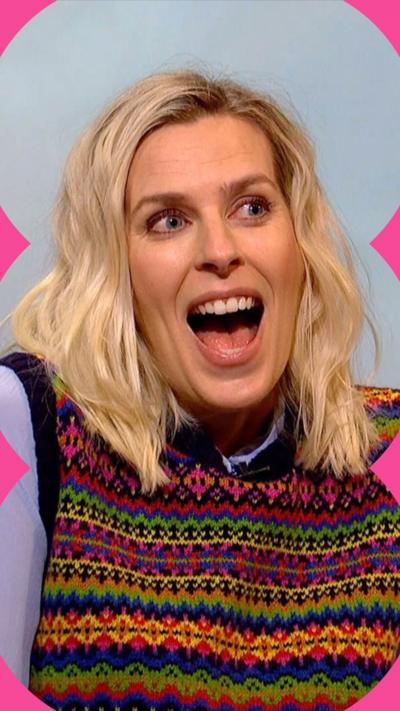 Sara Pascoe with a big smile on her face. She has shoulder length blonde hair and wears a multicoloured knitted tank top 