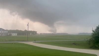 A tornado visible on the horizon