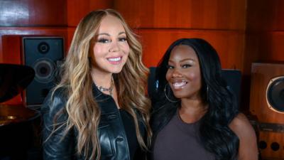 Mariah Carey and Nadia Jae pose together in a BBC radio studio