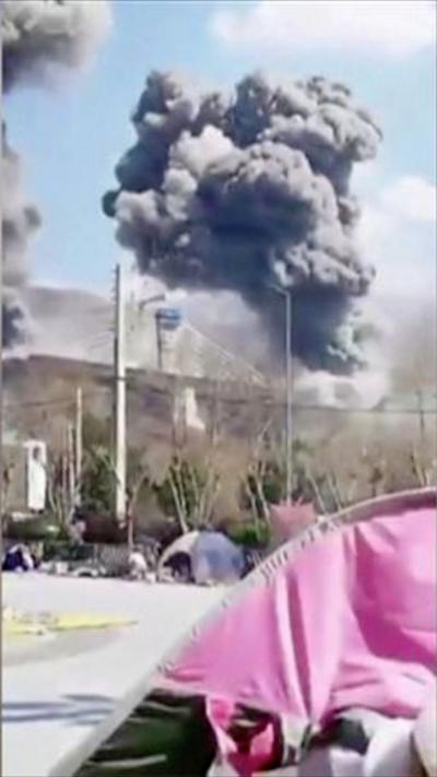 Bridge being destroyed in Iran - smoke seen billowing into the sky