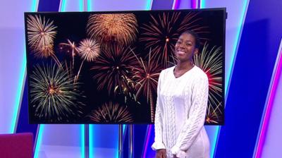 Shanequa in the studio with fireworks in the plasma