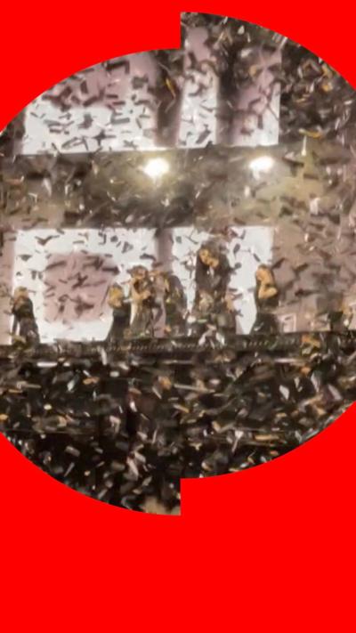 aespa dancing on stage, lots of confetti falls