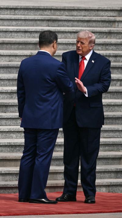 Trump and Xi shake hands
