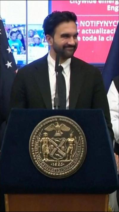Zohran Mamdani, Mayor of New York City behind a podium