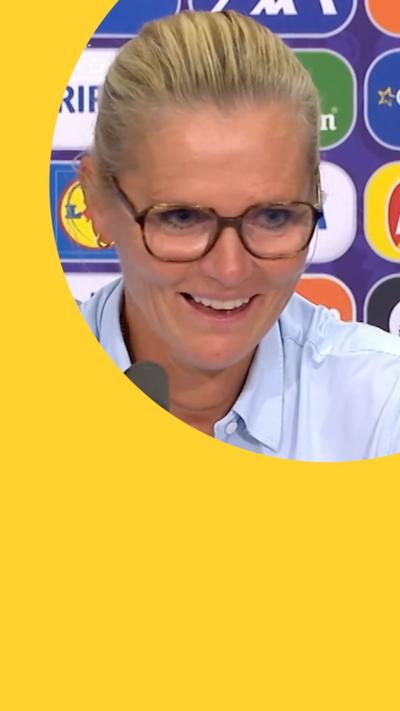 Sarina Wiegman smiles during a press conference 