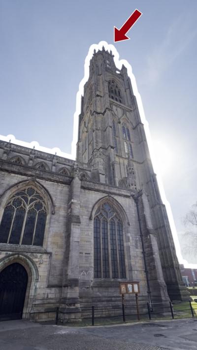 A view of Boston’s church, with an arrow pointing to the top, which visitors can now access on tours.