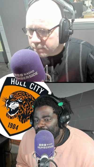 Two men behind microphones in a radio studio, with the Hull City logo superimposed on the picture.