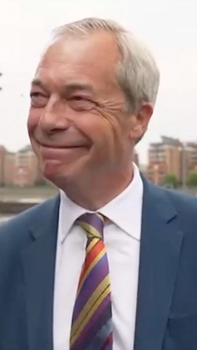 Farage smiling
