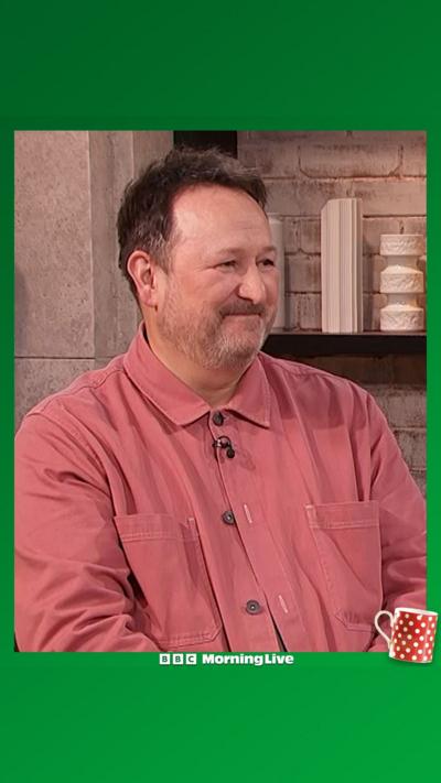 Mark Lane in the Morning Live studio wearing a carol coloured shirt