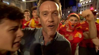 The BBC's Mark Lowen mobbed by happy fans