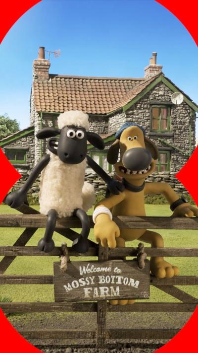 Shaun and Bitzer sit on a fence in front of Mossy Botton Farm 