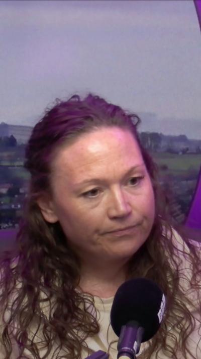Woman with long dark hair in a BBC studio