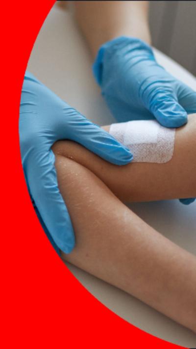 A plaster being applied on an arm 