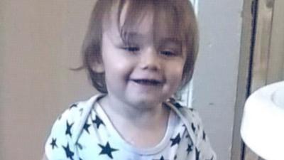 A smiling toddler