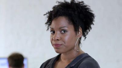 Actor Amanda Wright looks frustrated towards the camera