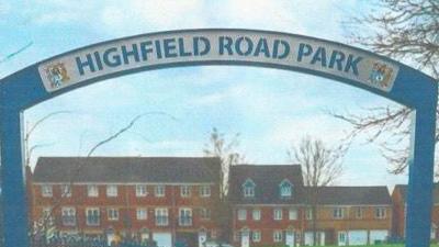 Blue signage which is to be installed at the site of the former Highfield Road stadium. It is blue overhead metal entrance, withe the name of the stadium on