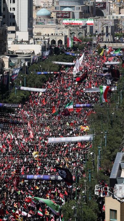 crowds gather in Iran