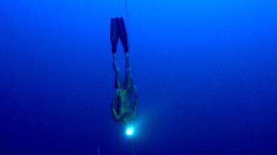 Russian freediver Alexey Molchanov plunges below the Mediterranean Sea in Limassol, Cyprus.