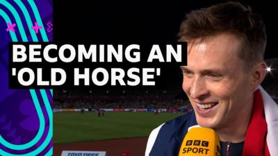 Karston Warholm smiles during his interview