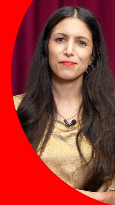 BBC culture correspondent Noor Nanji, wearing gold coloured top. 