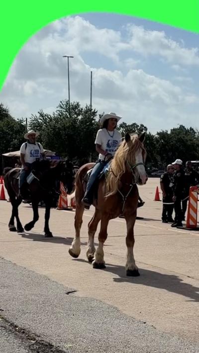 Uzbekistan fans arrive on horseback