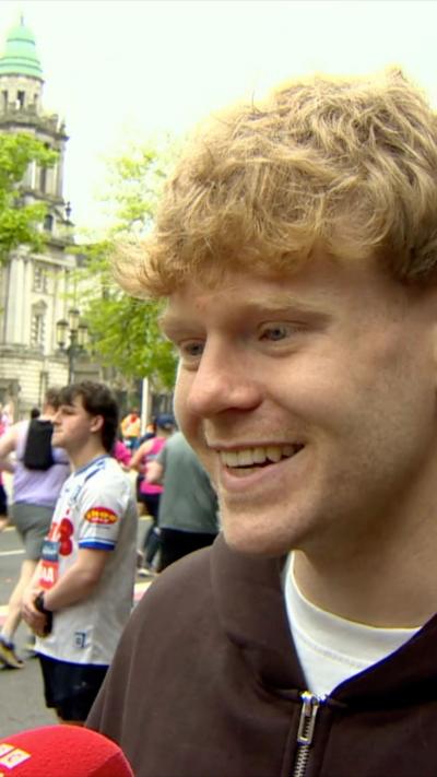 A man with sandy blonde hair 