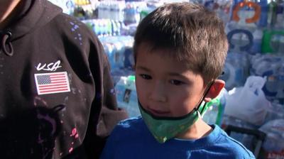 Six-year-old Oliver Lee talking to camera