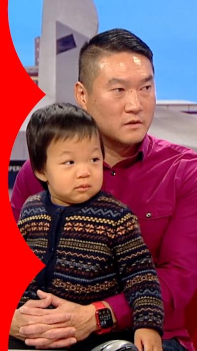 Toddler Oliver and his dad, Ricky Chu, on the BBC Breakfast sofa