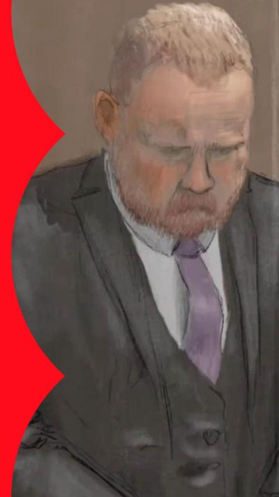 Courtroom sketch of a bearded man in a suit looking down solemnly.