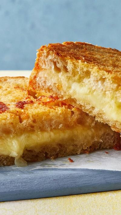A cheese toastie, one half stacked on top of the other.