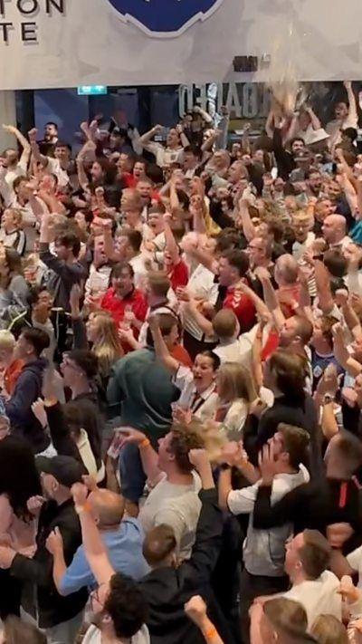 A large crowd of football fans at Ashton Gate Stadium in Bristol.